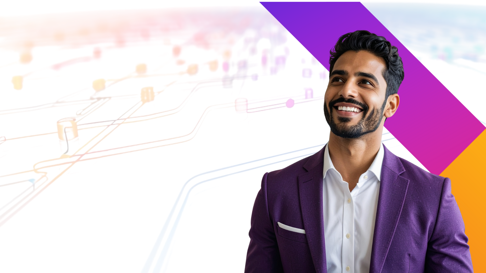 A smiling man in a purple blazer stands in front of an abstract background with colorful lines and shapes, suggesting technology or networking themes.