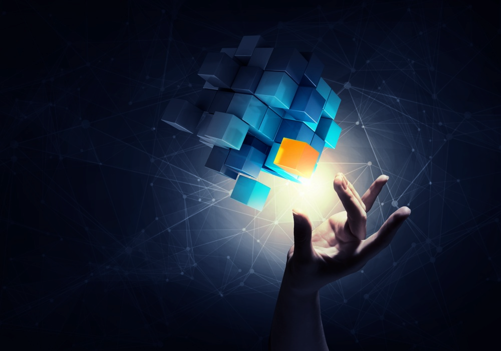 A hand reaches toward a cluster of floating 3D cubes emitting light. The cubes are mostly blue and form a dynamic shape, with connected lines and nodes in the dark background, creating a futuristic and technological ambiance.